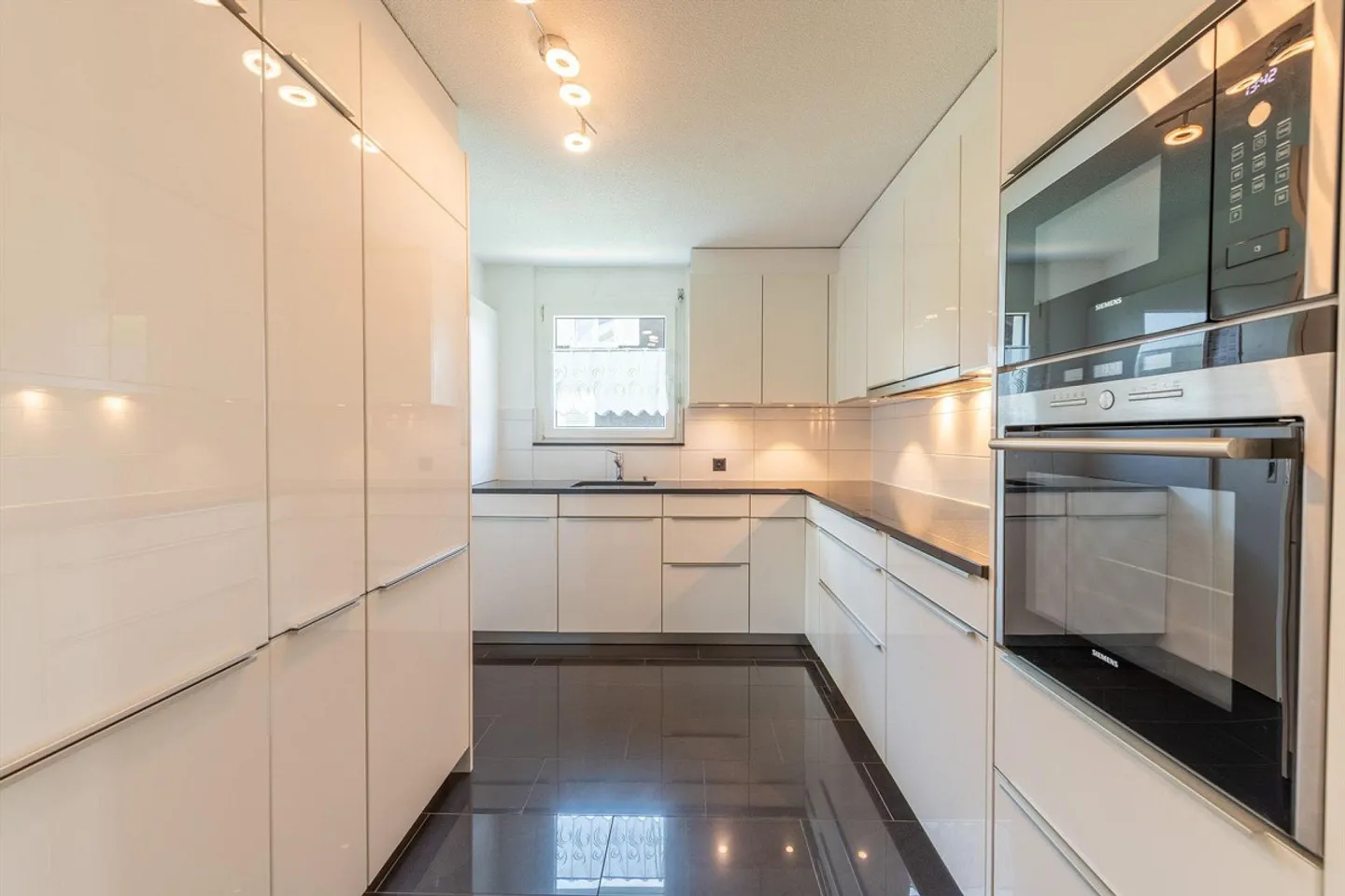 A Home to Feel Good - Bright, Modern 4.5-Room Condominium - Photo 5 of 13