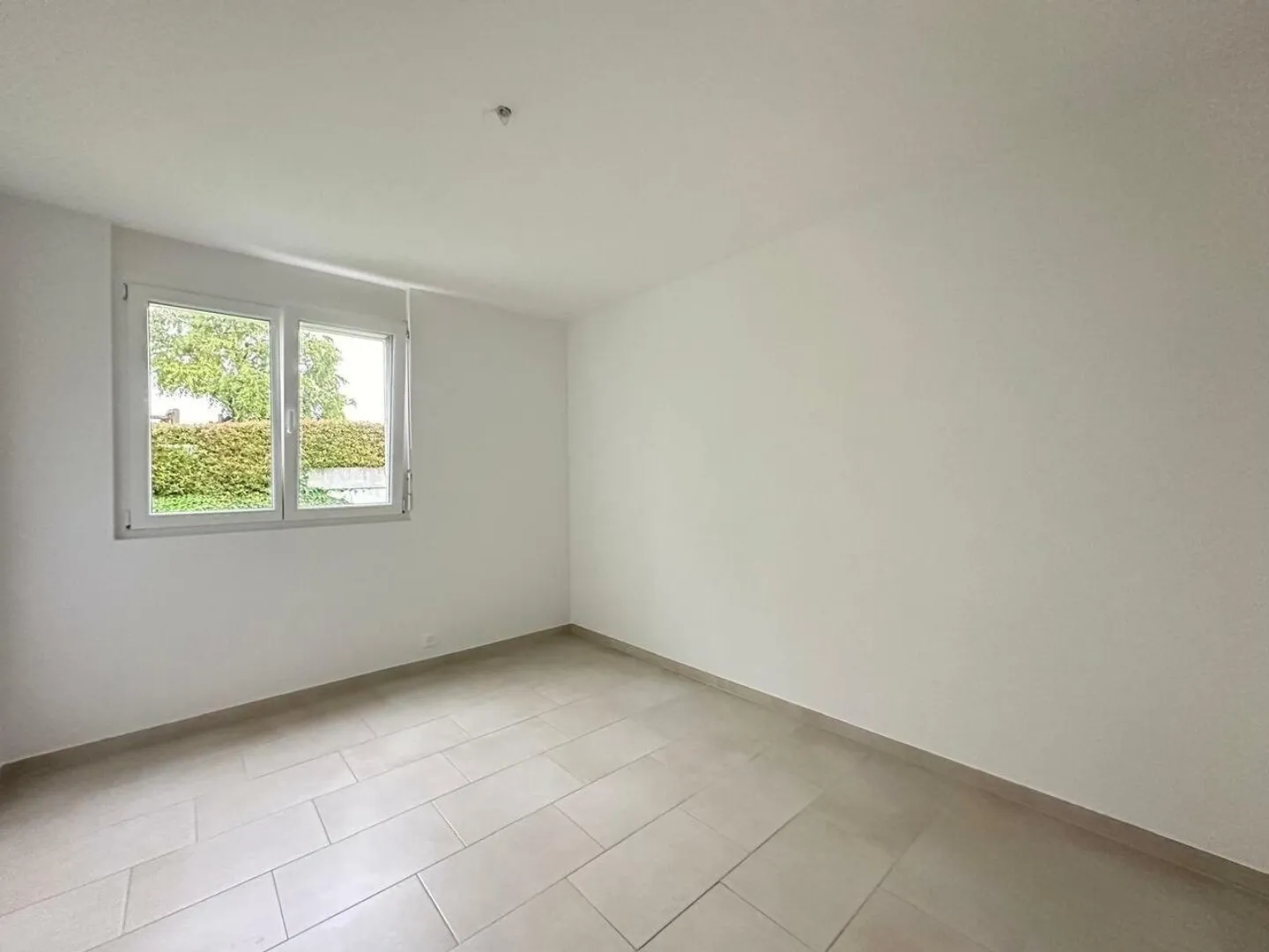 Magnifique appartement 4.5 pièces au rez-de-chaussée - Photo 4 sur 7