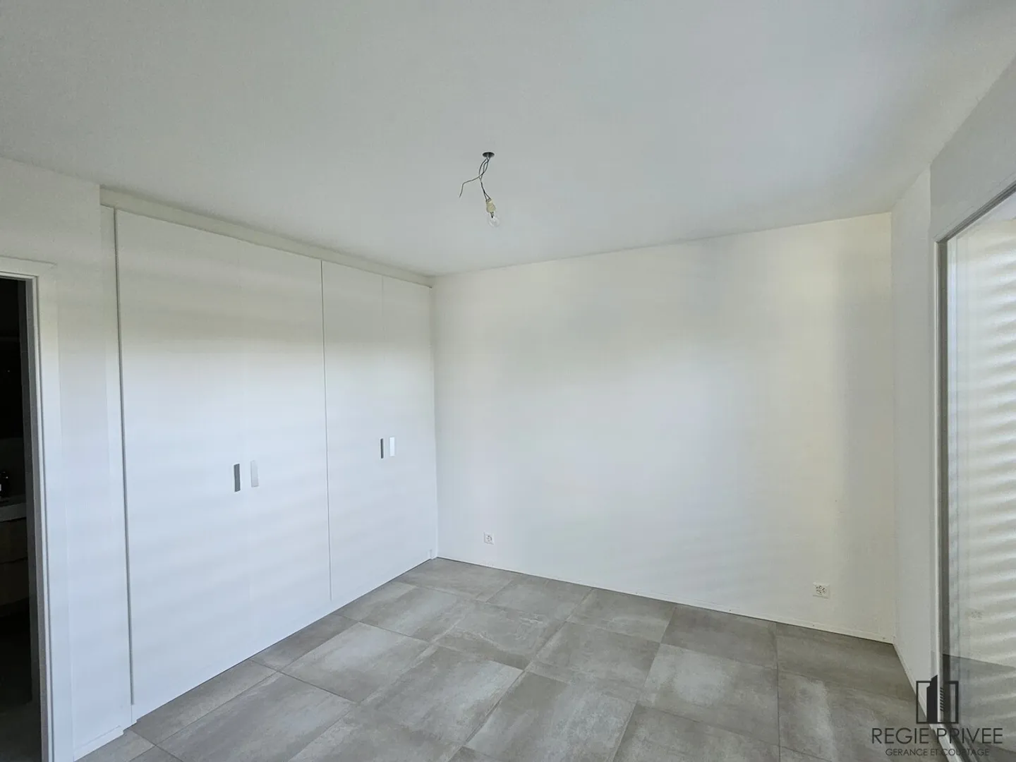 Appartement de 3.5 pièces au rez-de-chaussée - Photo 4 sur 7