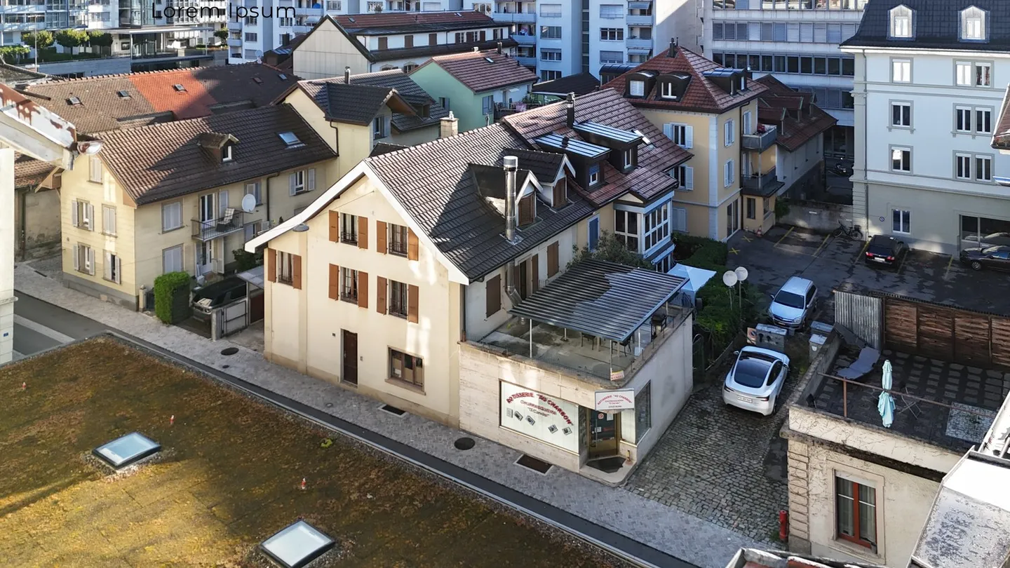 Edificio redditizio con 3 appartamenti e 1 attività commerciale a Friburgo, quartiere Beaurega - Foto 1 di 9