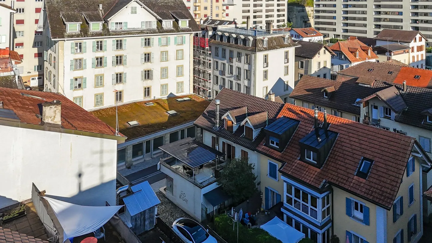 Edificio redditizio con 3 appartamenti e 1 attività commerciale a Friburgo, quartiere Beaurega - Foto 8 di 9