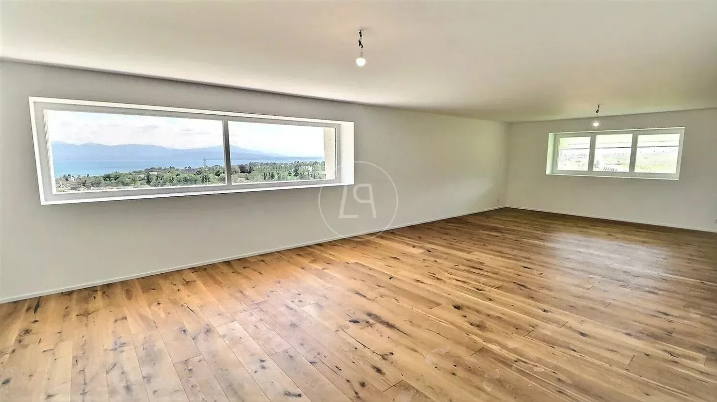 Renoviertes Penthouse mit Seeblick - Foto 3 von 12