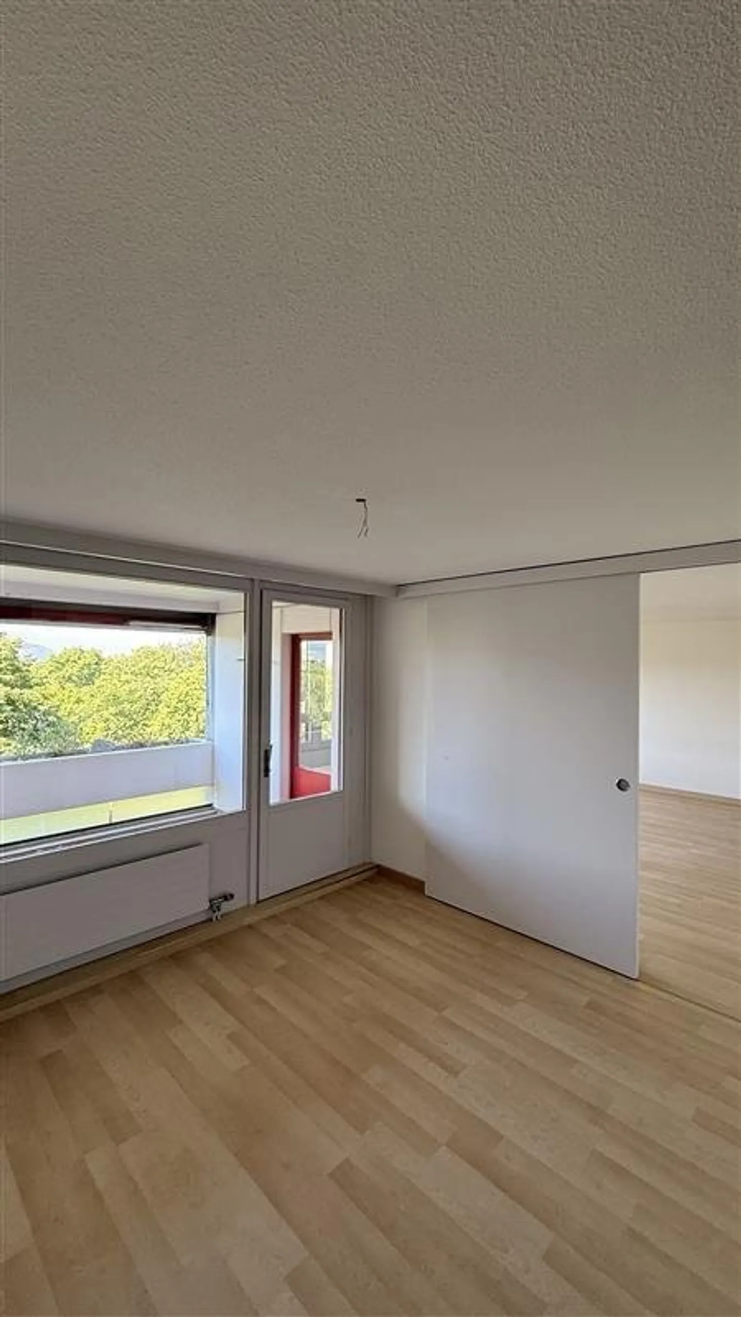 Votre nouveau chez-vous avec vue - 4,5 pièces au 8ème étage de Liebrüti - Photo 5 sur 9