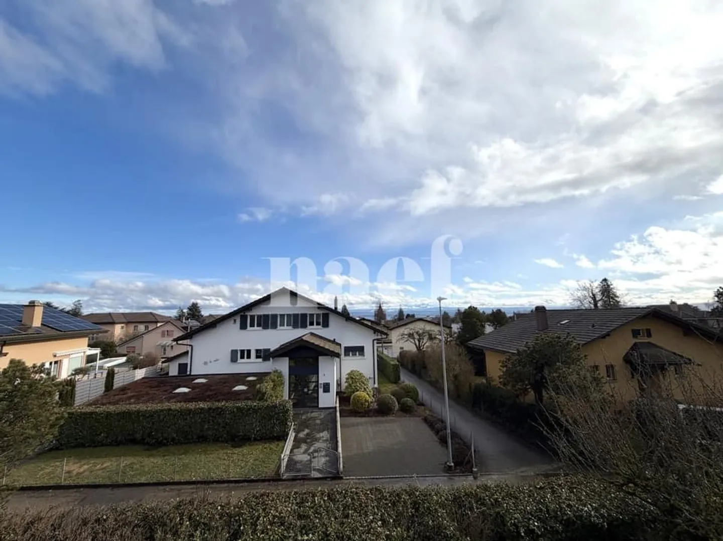 Erhabene 4.5-Zimmer-Wohnung mit Balkon in Bôle - Foto 1 von 10