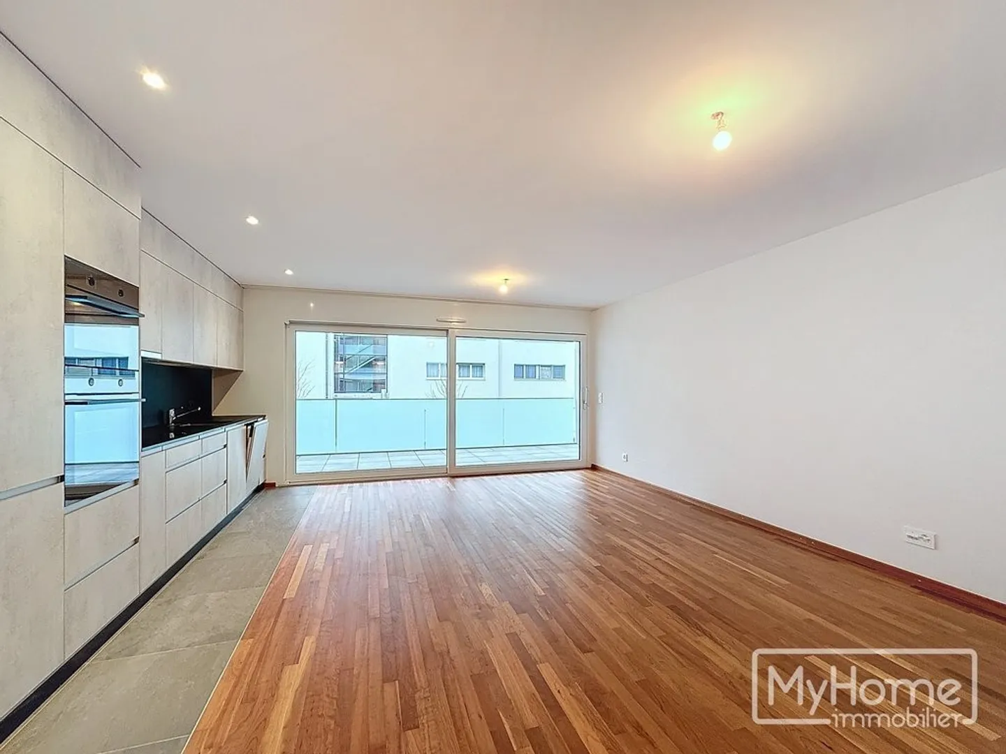 Appartement de 4.5 pièces au 2ème étage d'un tout nouveau quartier - Photo 1 sur 11