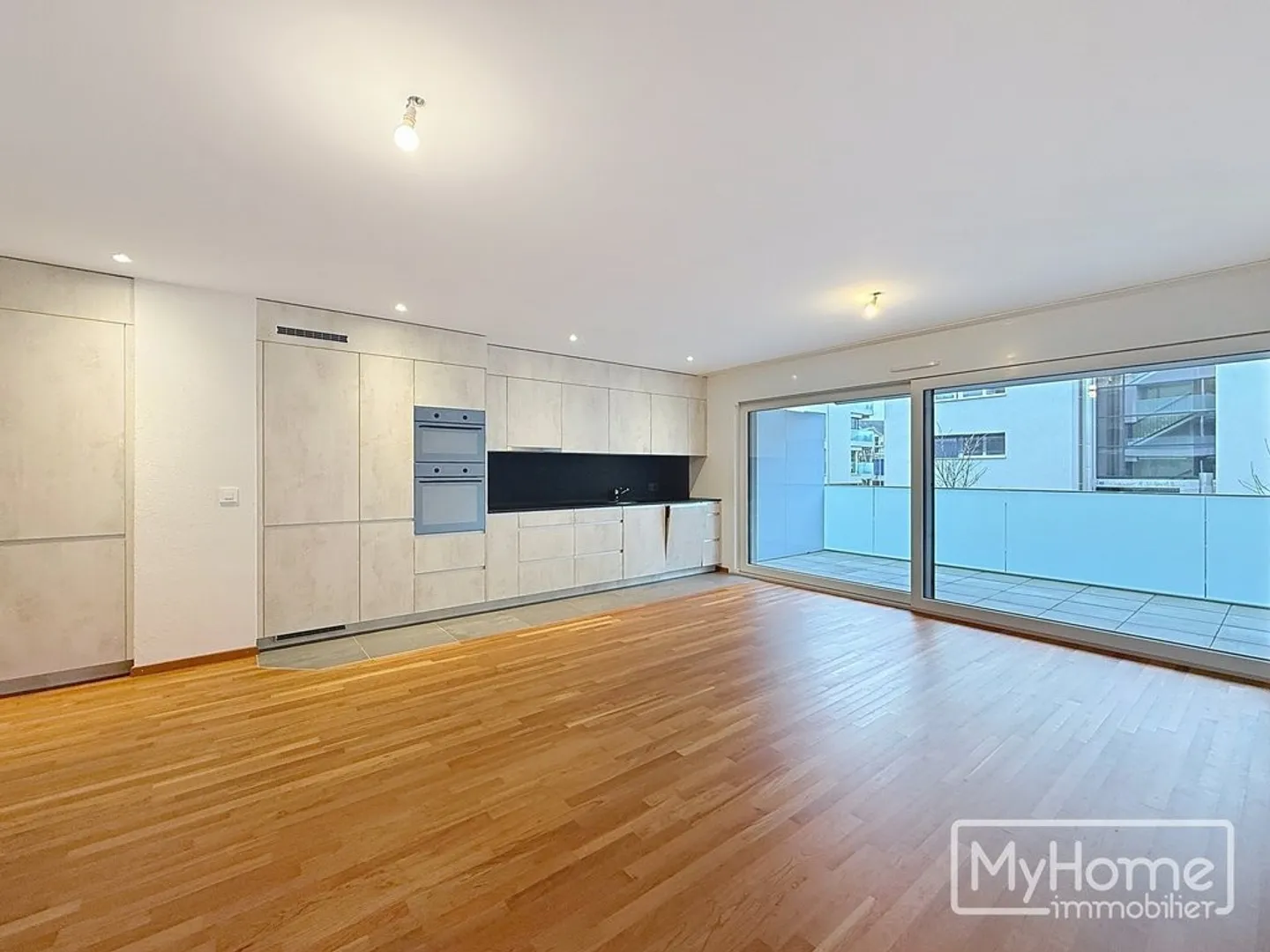 Appartement de 4.5 pièces au 2ème étage d'un tout nouveau quartier - Photo 2 sur 11