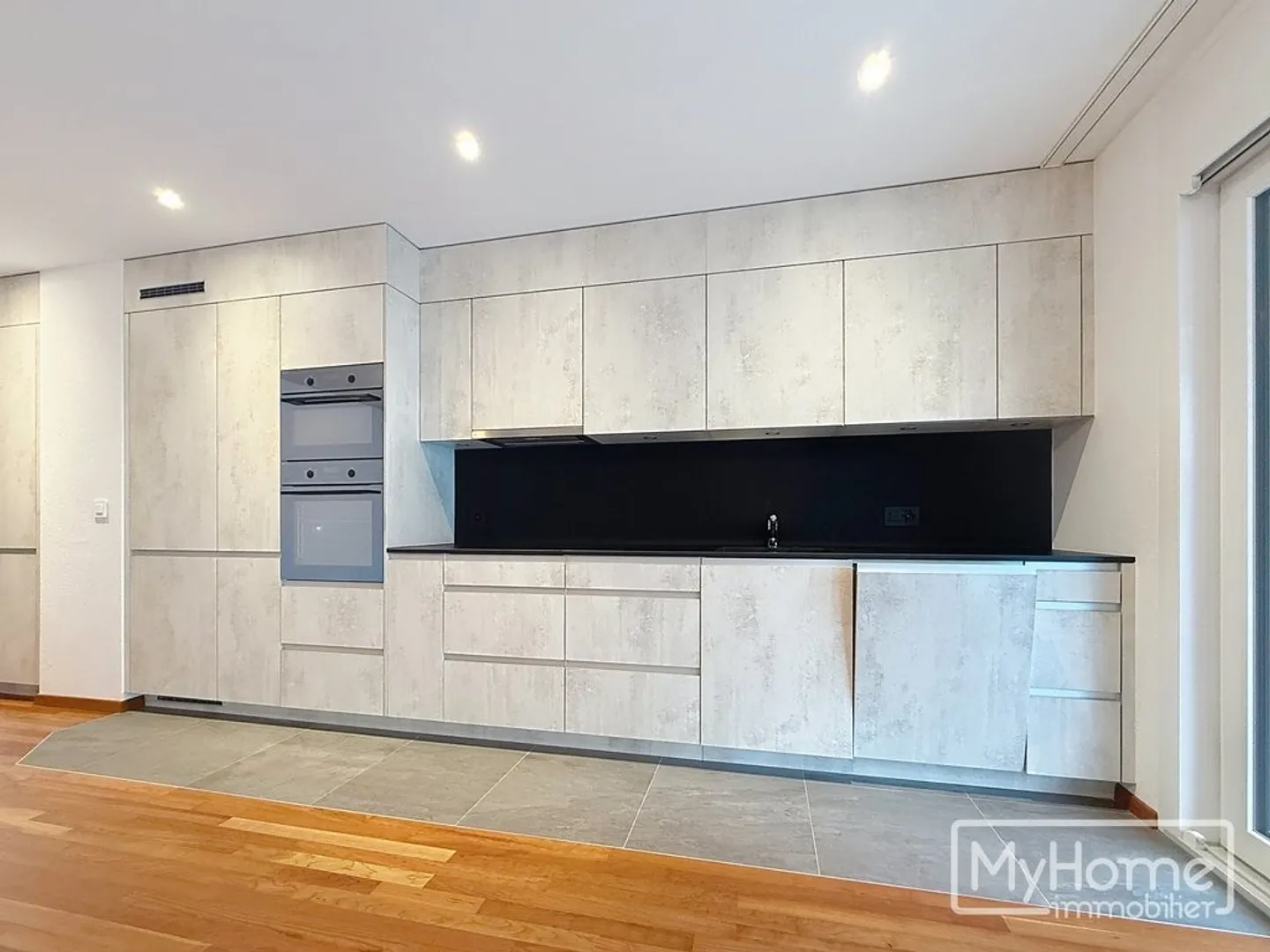 Appartement de 4.5 pièces au 2ème étage d'un tout nouveau quartier - Photo 3 sur 11