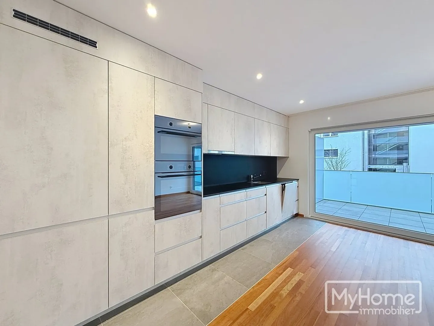 Appartement de 4.5 pièces au 2ème étage d'un tout nouveau quartier - Photo 4 sur 11