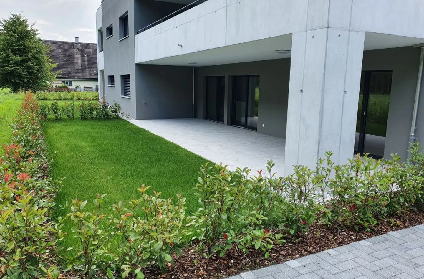 Appartement moderne de 3,5 pièces avec patio - Photo 8 sur 9