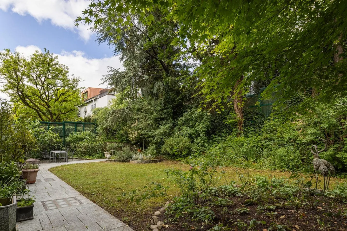 Jardin privé de 350 m² au cœur de Zurich — Appartement de jardin au caractère unique - Photo 12 sur 13