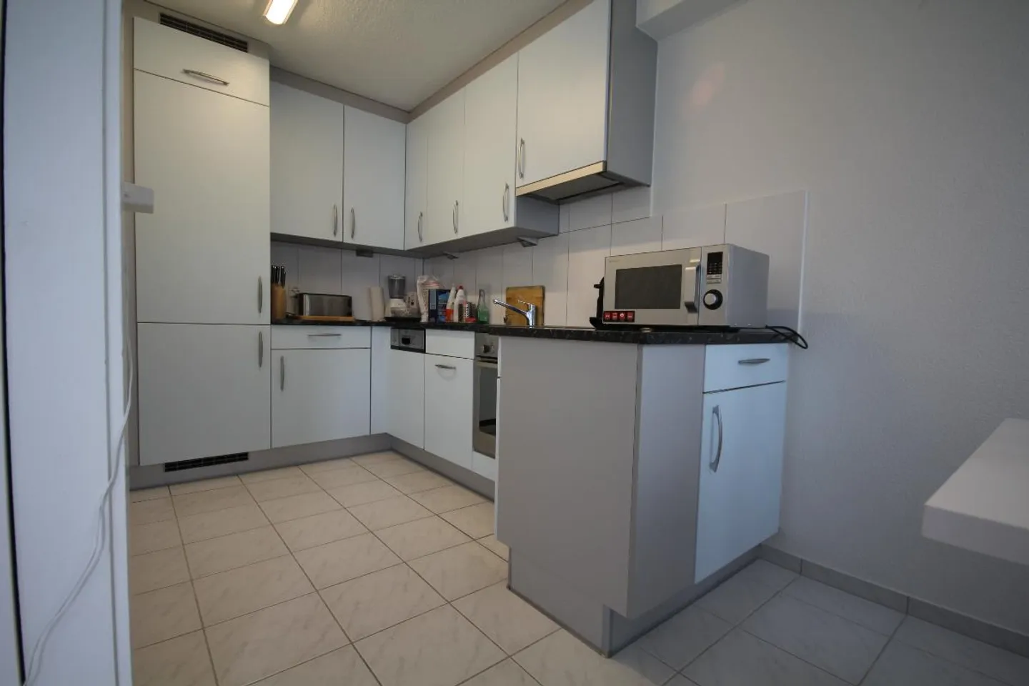 Appartamento moderno 1,5 locali, balcone sul giardino, in una casa molto ben tenuta - Foto 2 di 10