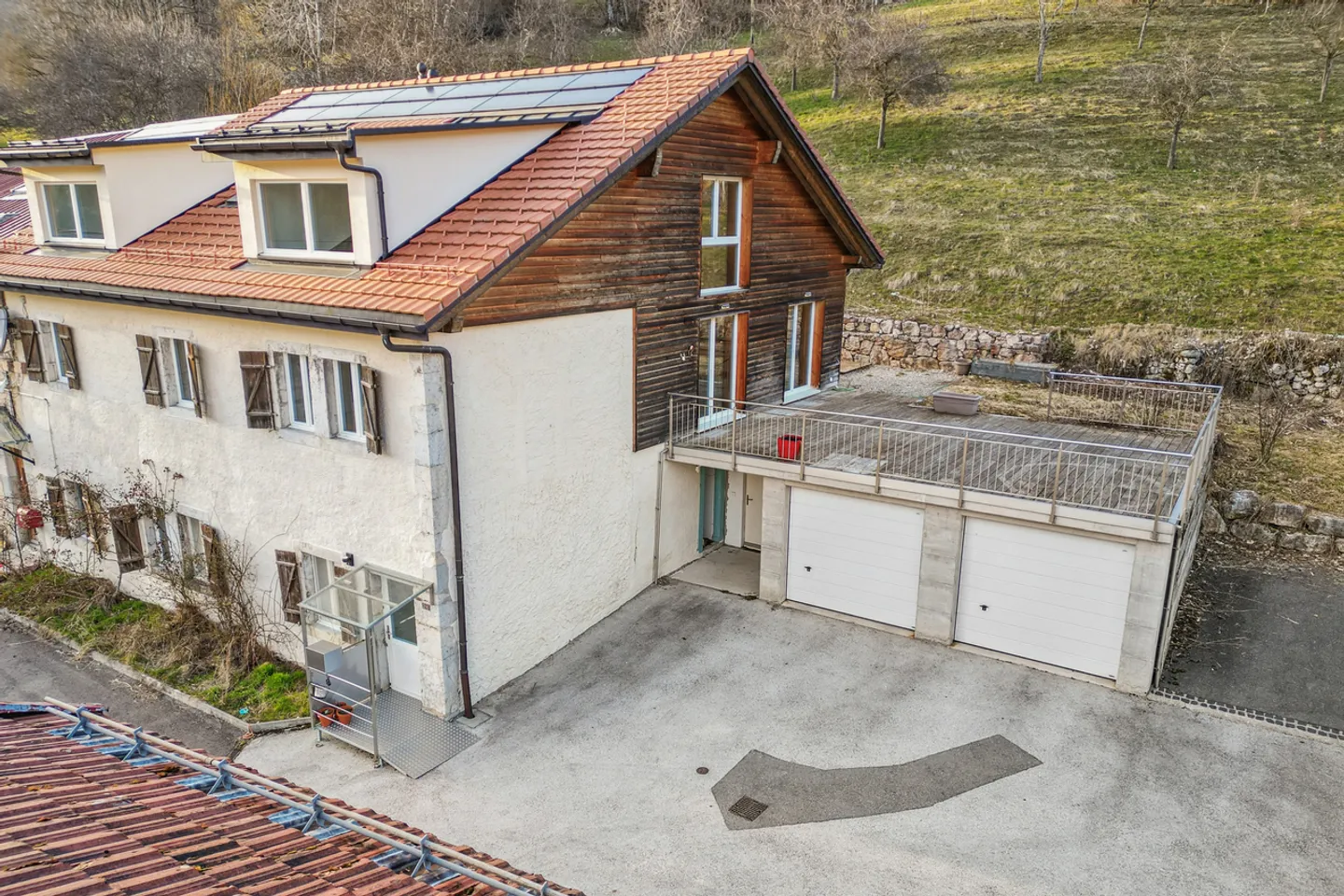 Komfort im Duplex und Ertrag im Erdgeschoss: Haus in Ste-Croix - Foto 11 von 13