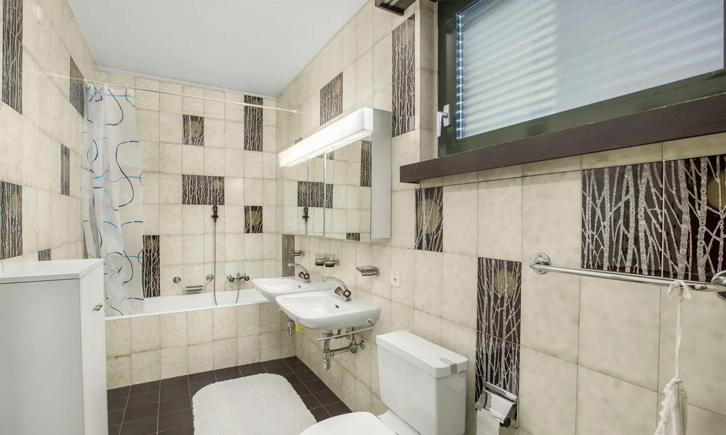 Geräumige 3.5-Zimmer-Wohnung mit atemberaubendem Seeblick in Aldesago - Foto 8 von 10