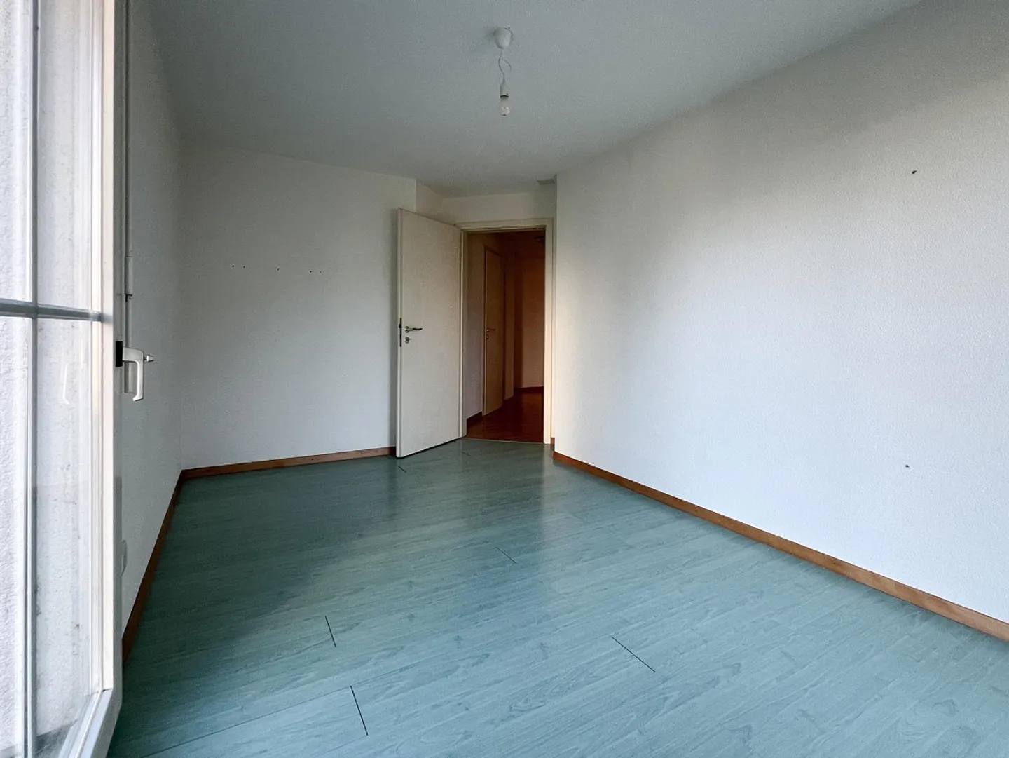 Appartement au rez-de-chaussée dans un quartier calme et familial - Photo 11 sur 18