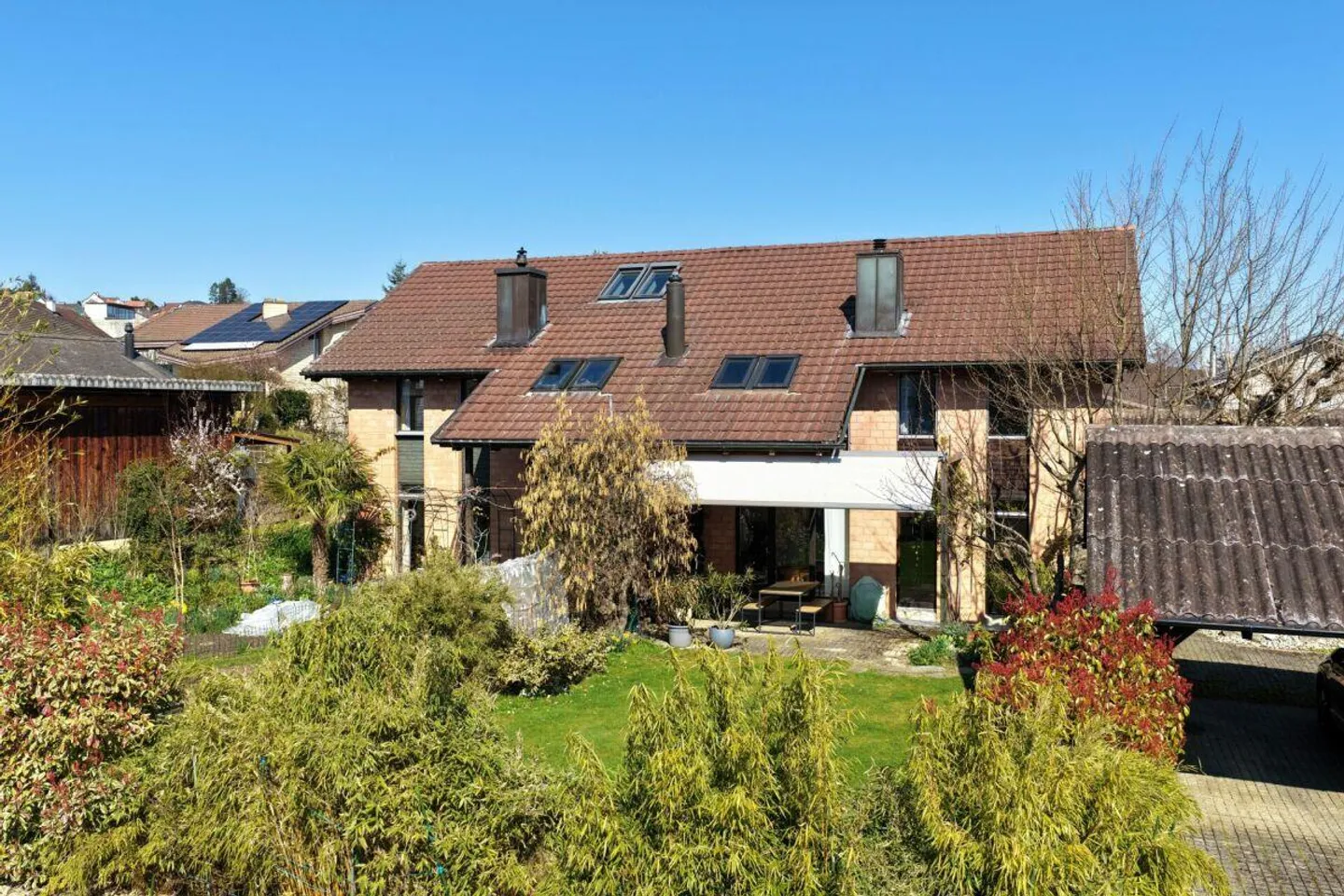 Stylishly modernized, semi-detached single-family house with sunny garden - Photo 1 of 12