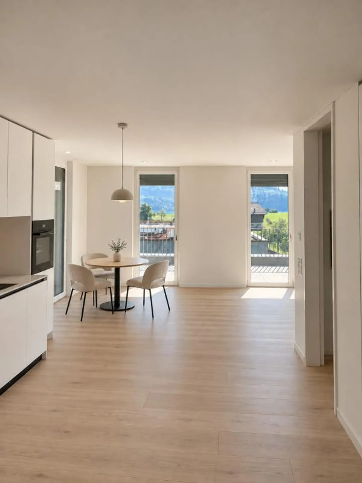 Nuova costruzione - Appartamento attico 2.5 locali con vista spettacolare sul lago e sulle Alpi - Foto 3 di 7