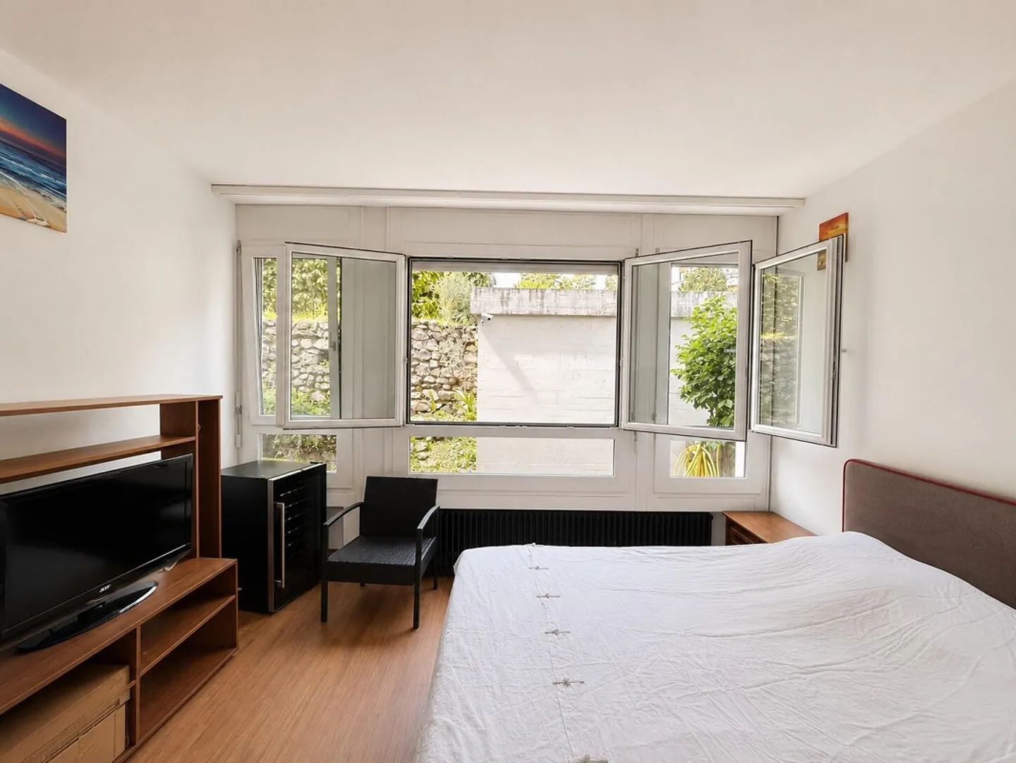 GROßE 3.5 ZIMMER MIT GROSSARTIGEM PRIVATGARTEN IN LUGANO BESSO - Foto 8 von 9