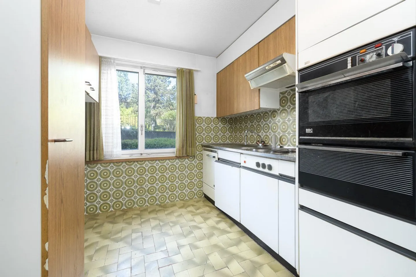 Renovate & Arrive with a View of the Green - Photo 7 of 9