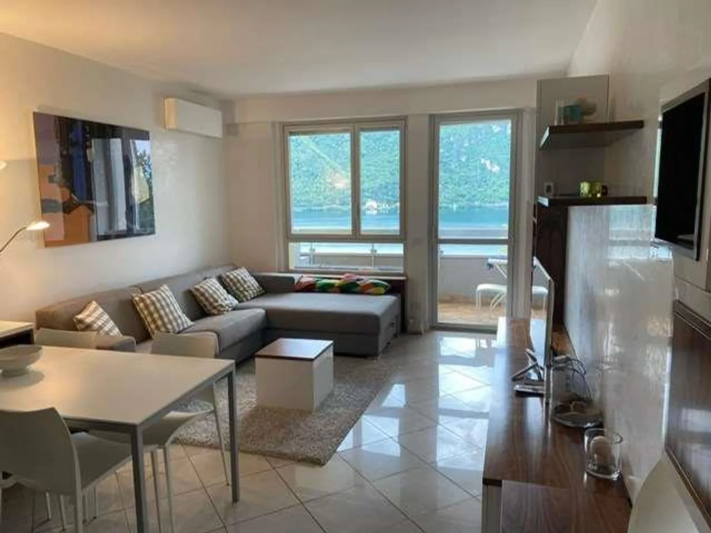 Bellissimo appartamento con 2,5 stanze e vista lago a Bissone in vendita - Foto 1 di 3