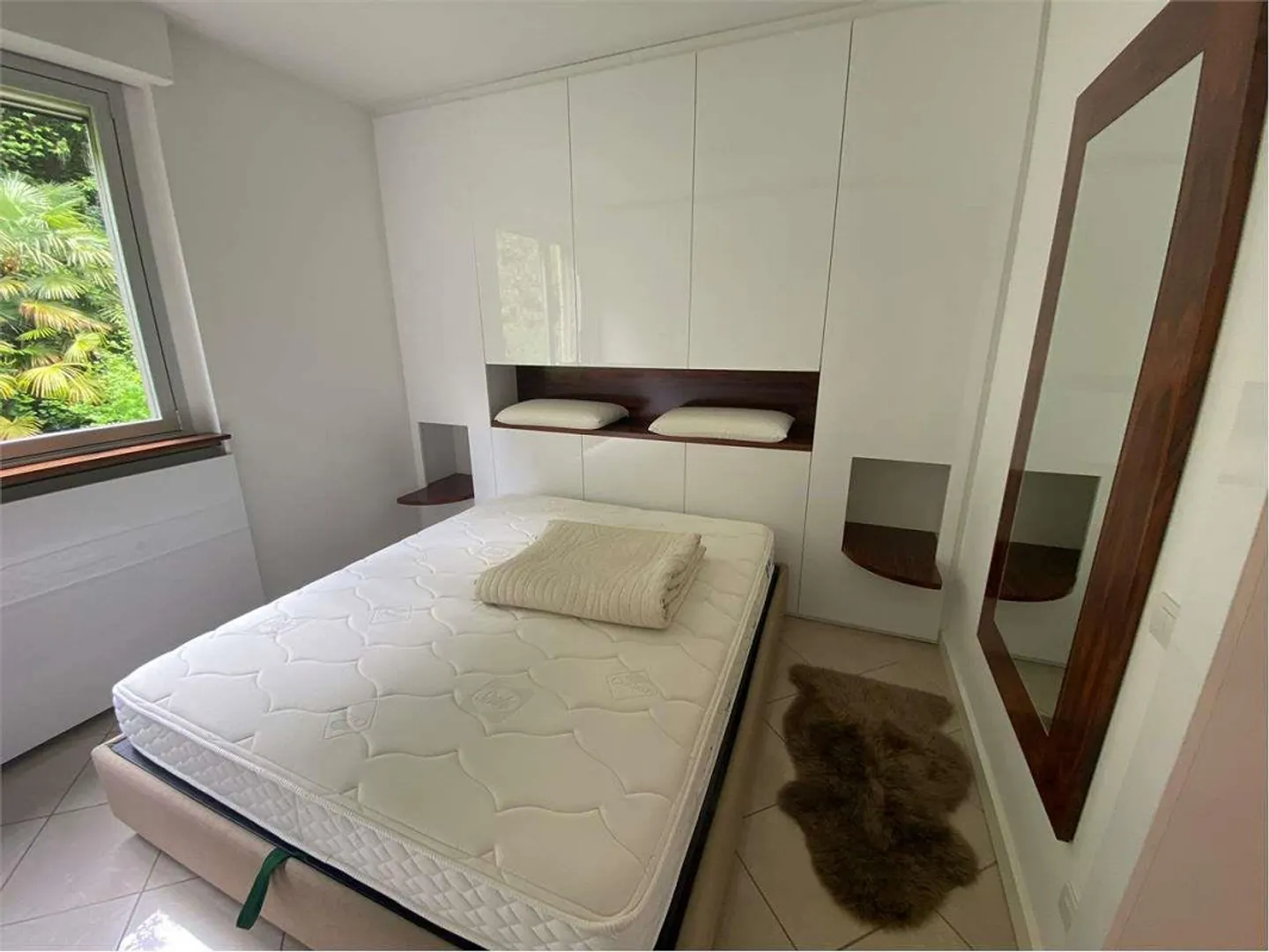 Bellissimo appartamento con 2,5 stanze e vista lago a Bissone in vendita - Foto 2 di 3