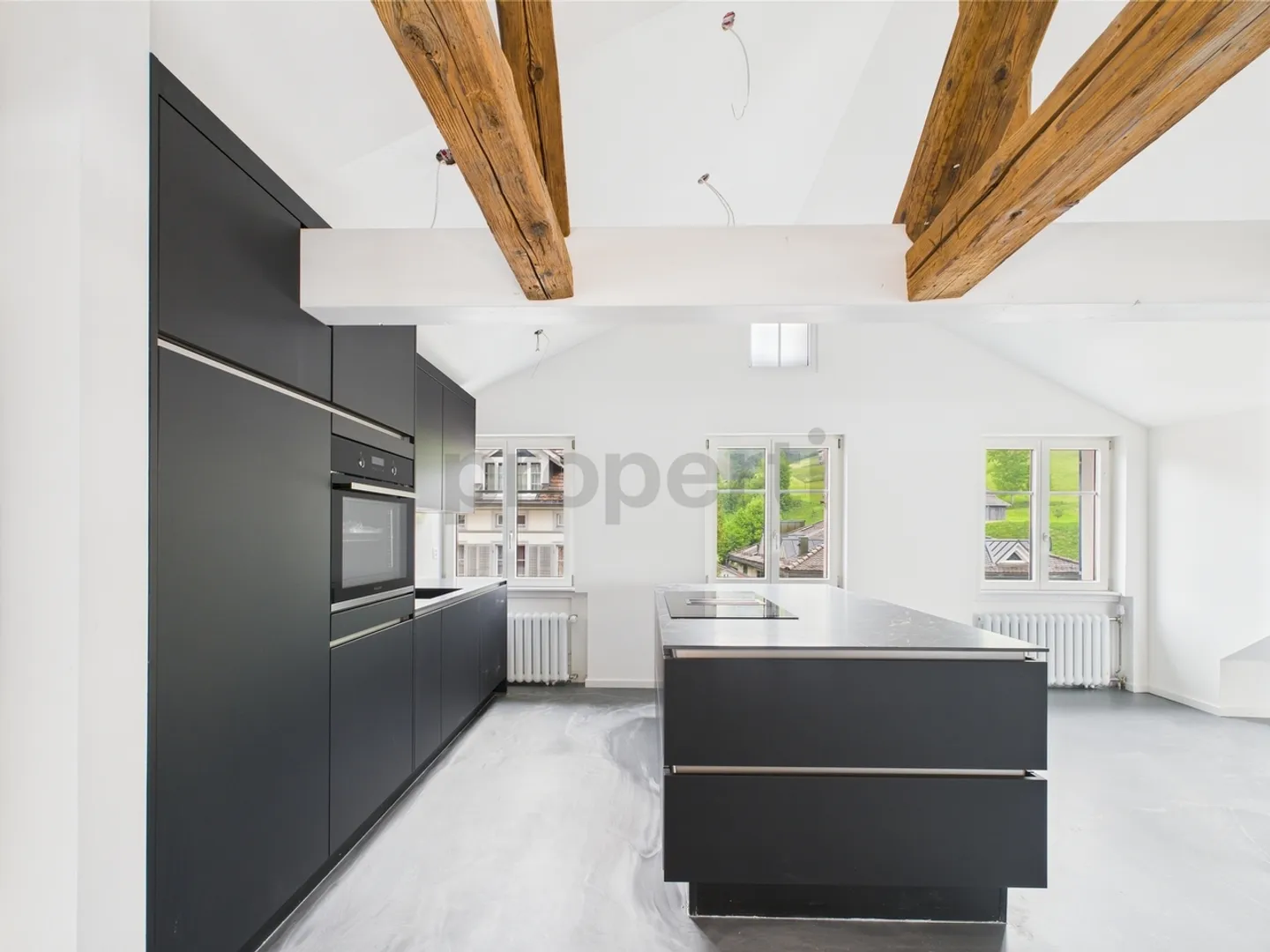Loft moderne avec charme et vue - Vivre au-dessus des toits de Lichtensteig - Photo 2 sur 9