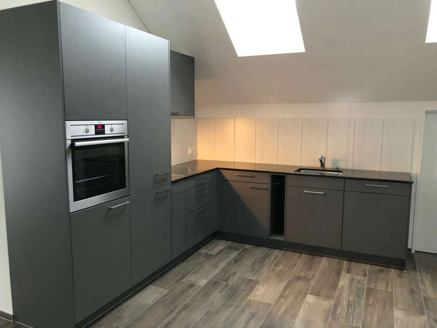 Charmante Dachwohnung - Foto 3 von 13