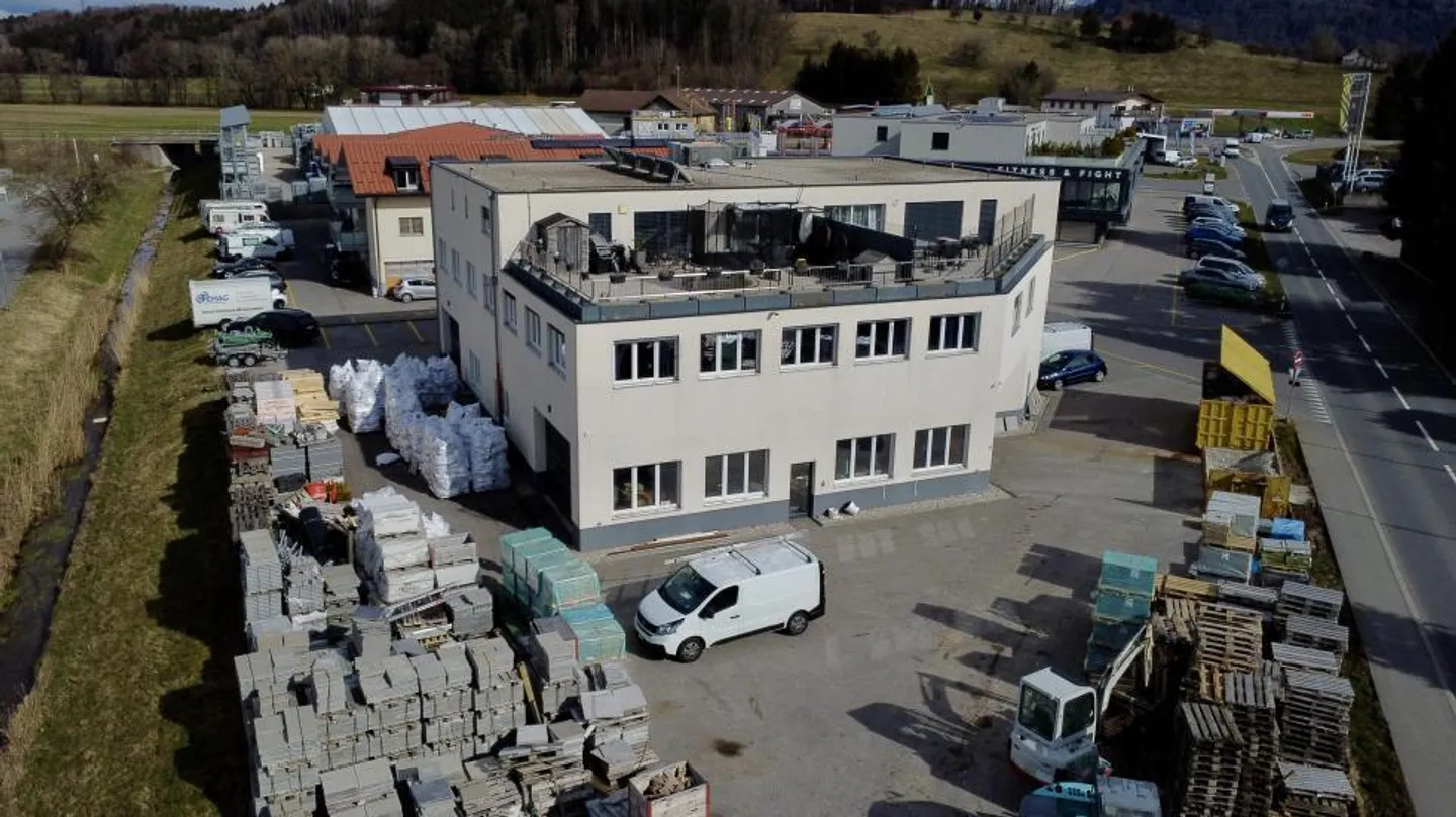 New building with many parking spaces - Photo 1 of 13