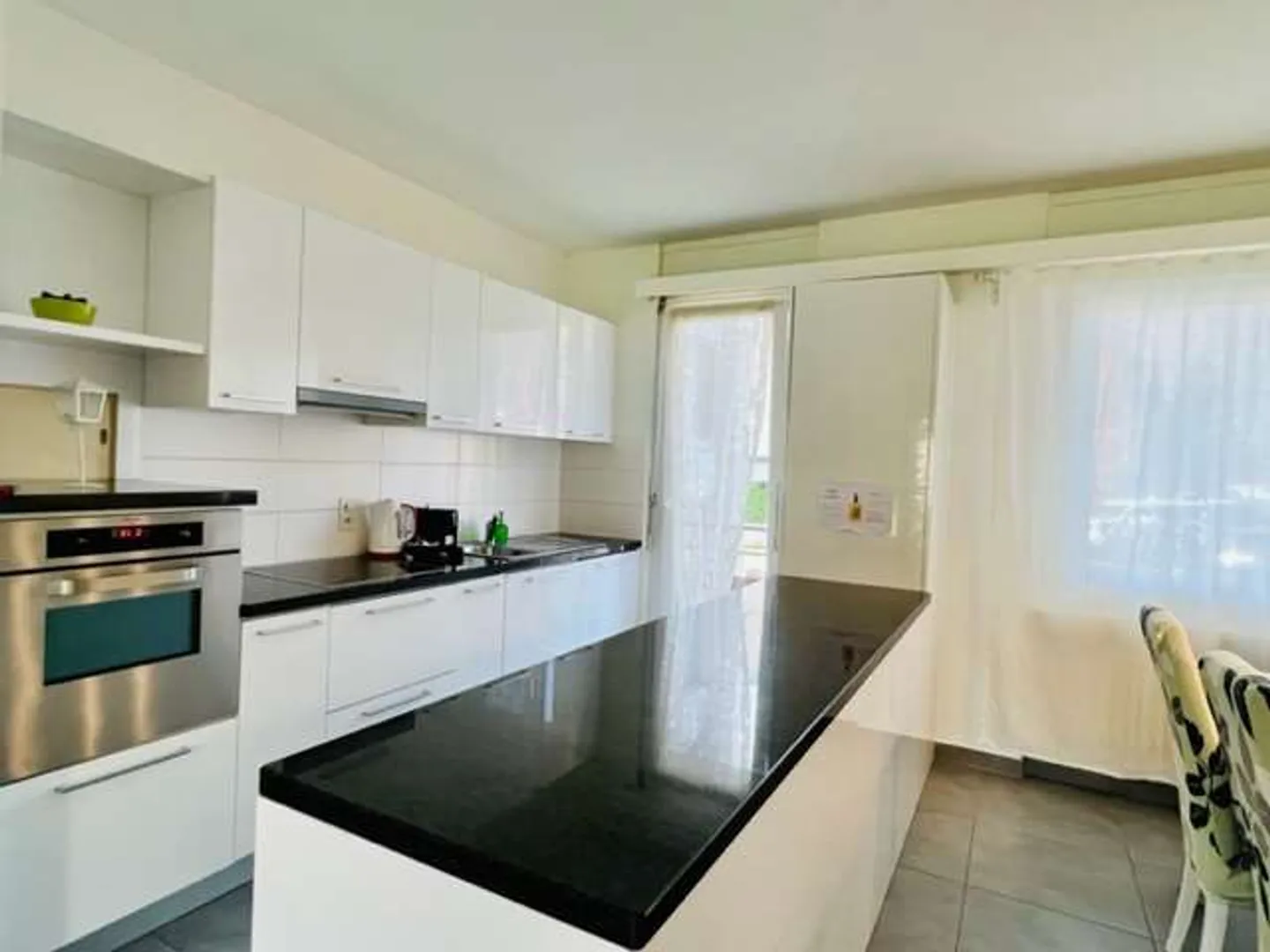 Appartement confortable de 4,5 pièces avec jardin - Photo 13 sur 13