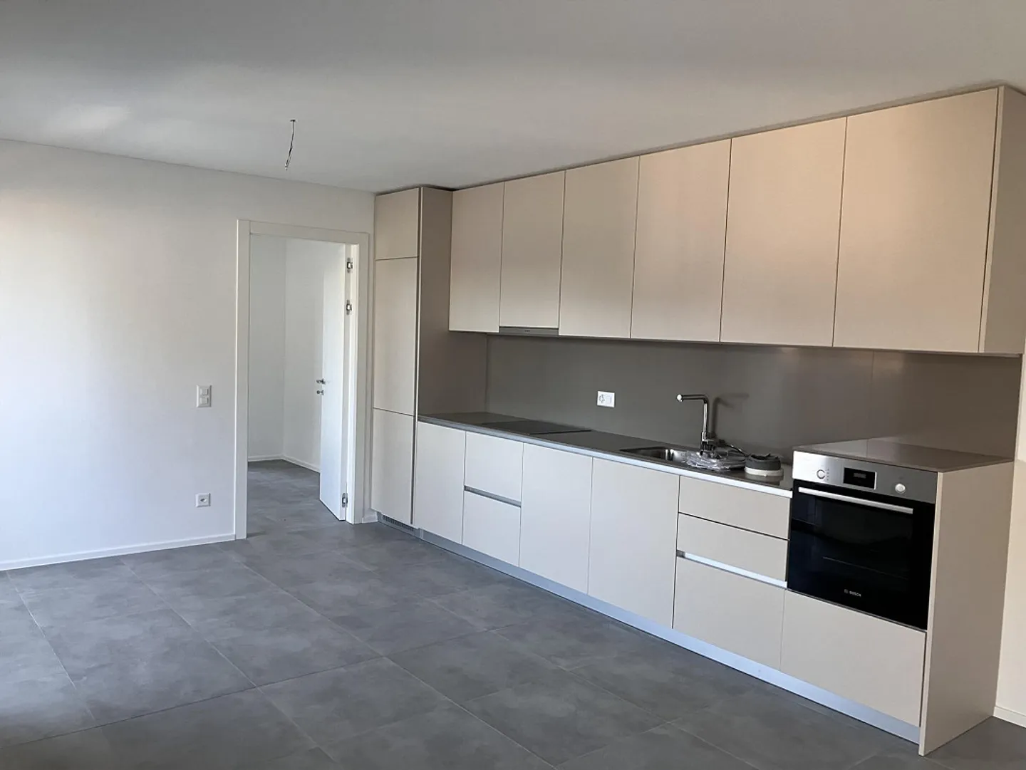 MENDRISIO – NOUVEAU 2½ PIÈCES EN PREMIÈRE LOCATION AVEC TERRASSE ET PLACE DE PARKING - Photo 1 sur 8