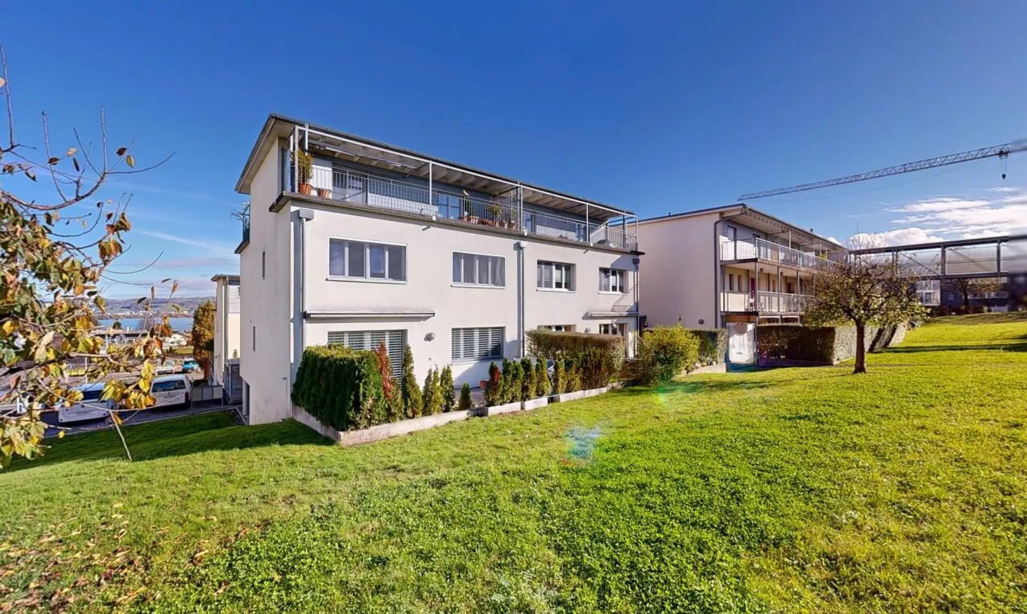 4.5-Room Maisonette Apartment with Lake View in Hünenberg See - Photo 1 of 11