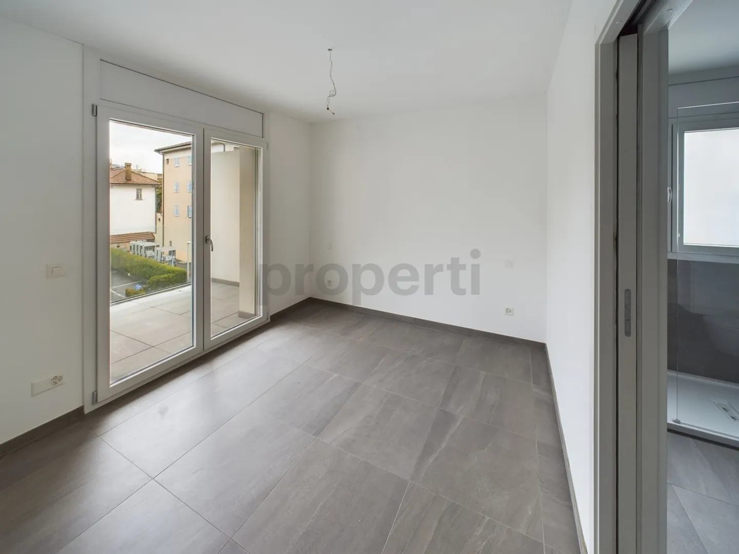 Modernes 3,5-Zimmer-Apartment in Caslano - Foto 5 von 11