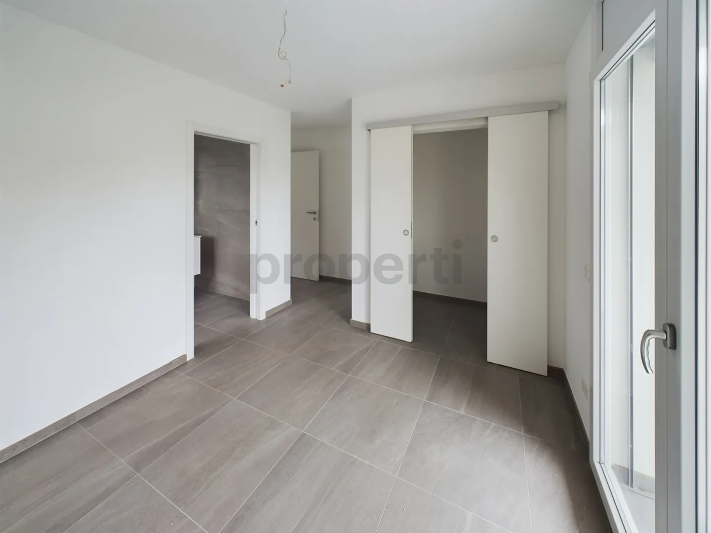 Modernes 3,5-Zimmer-Apartment in Caslano - Foto 6 von 11