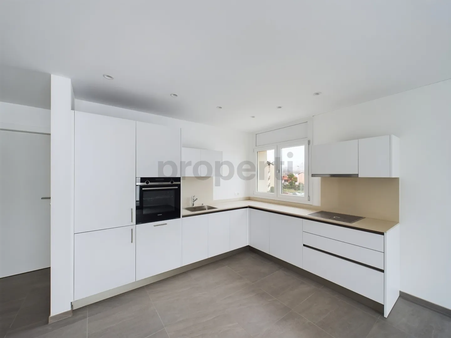 Modernes 3,5-Zimmer-Apartment in Caslano - Foto 2 von 11