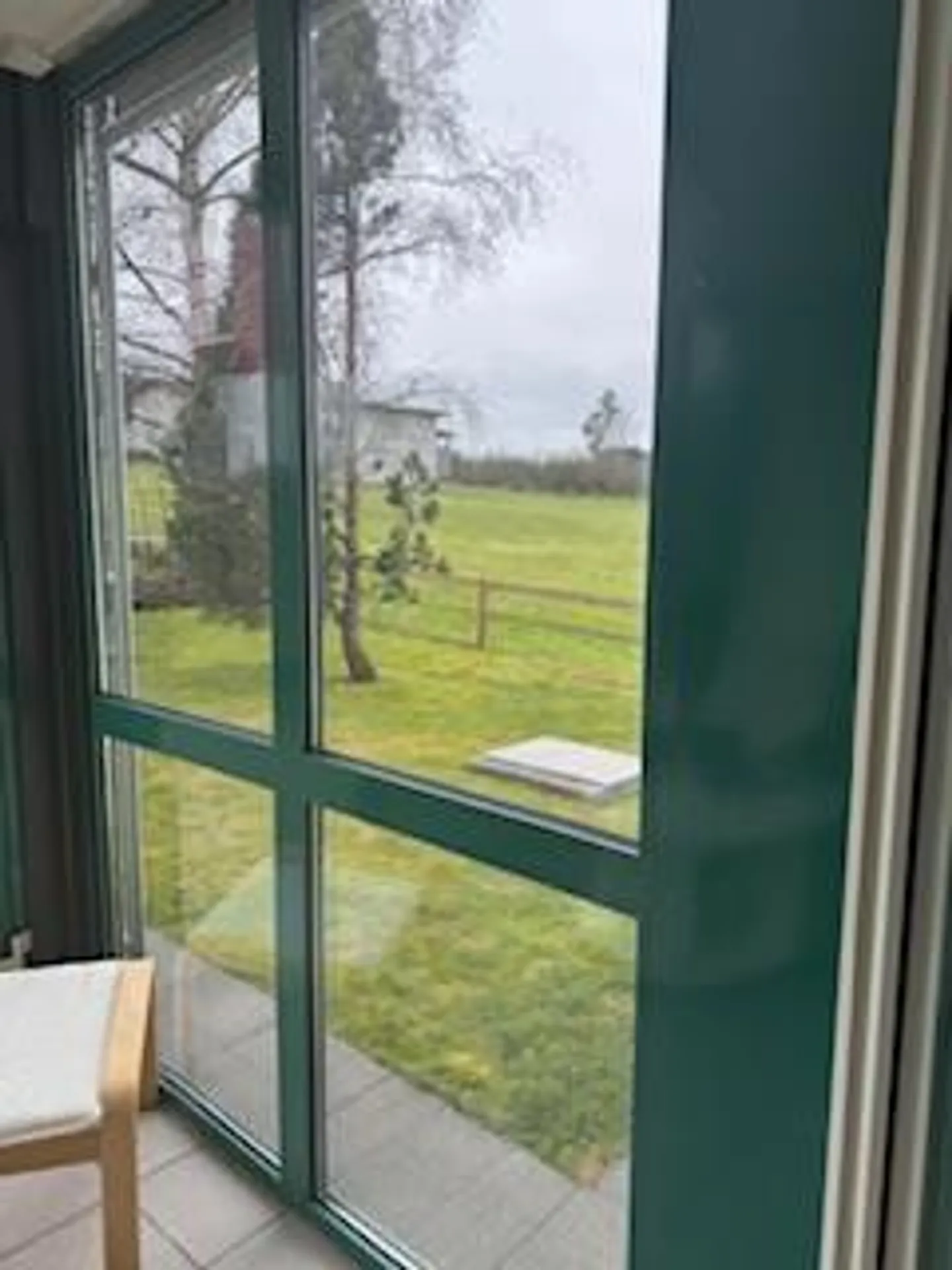 Appartamento 2,5 locali (58m2) nel verde con terrazza e giardino d'inverno - Foto 5 di 13