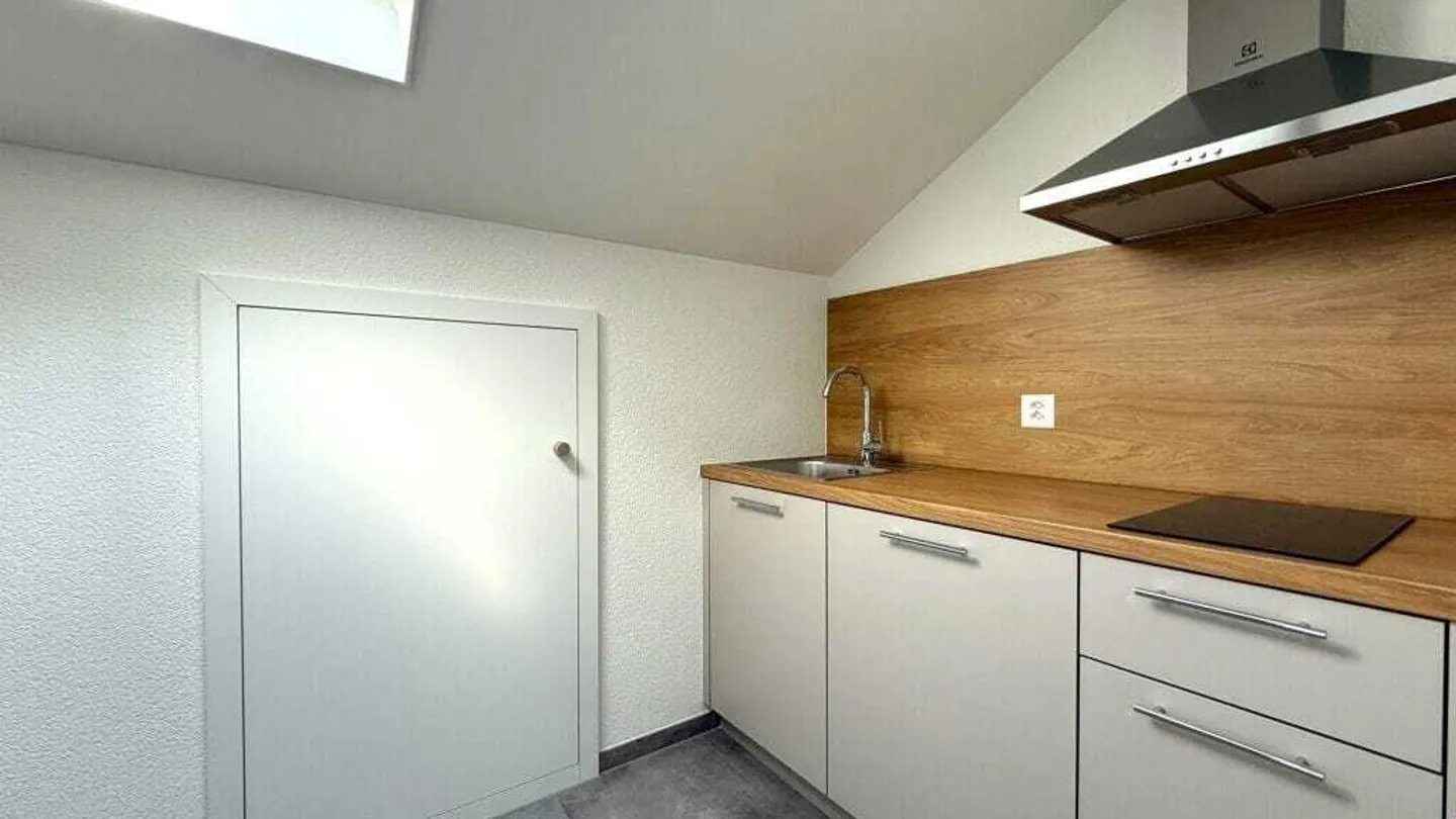 Charmant appartement en loft 2.5 pièces - Photo 3 sur 9