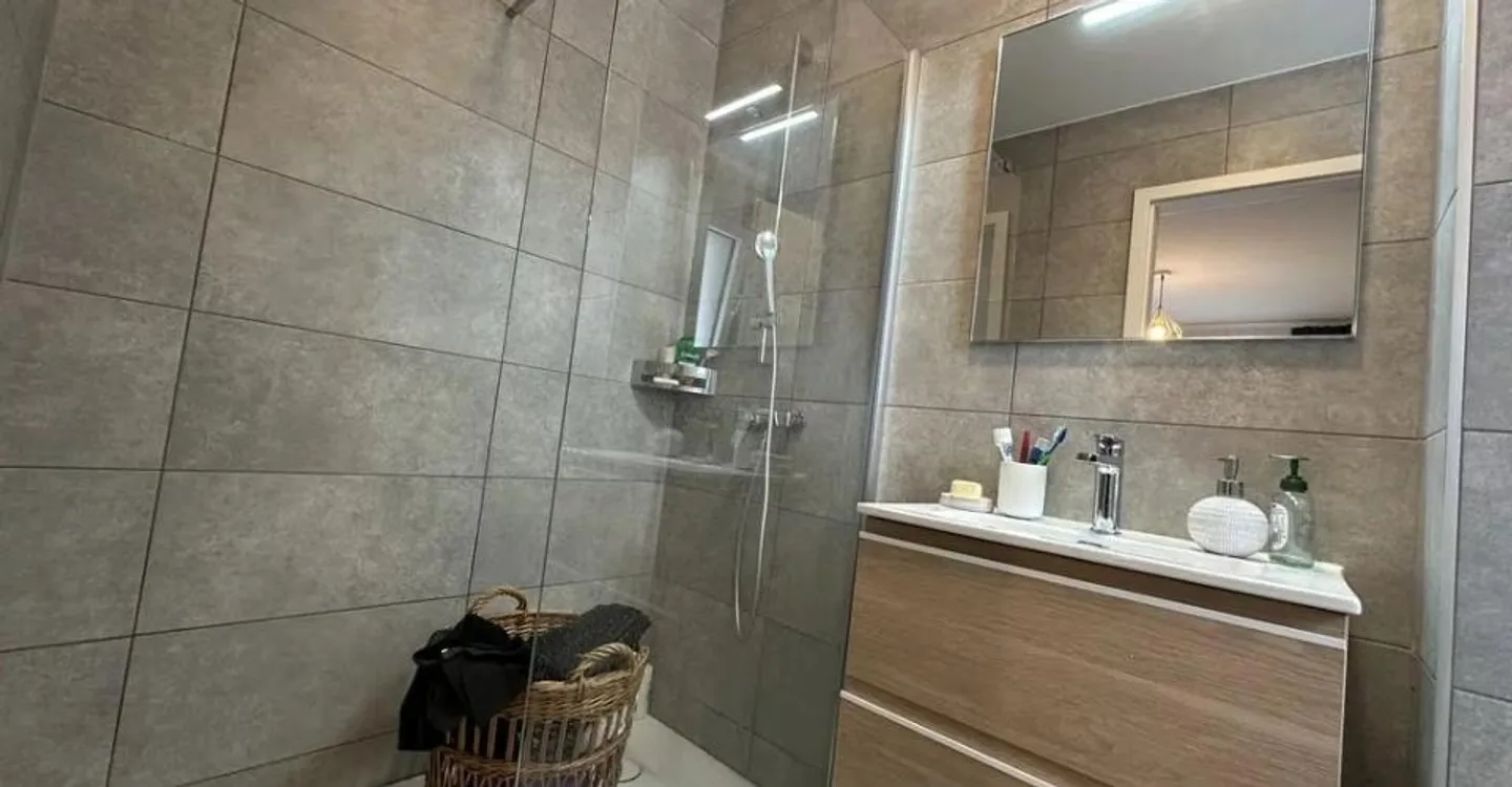 Appartement au rez-de-chaussée - Photo 7 sur 10