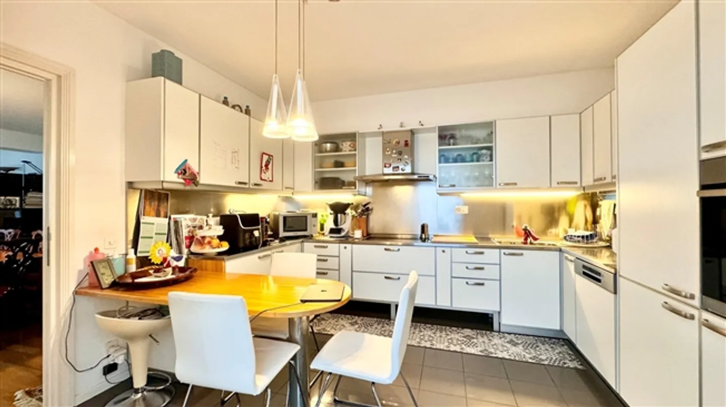 Duplex Penthouse Charmant avec Double Vue et Terrasse sur le Toit - Photo 8 sur 20