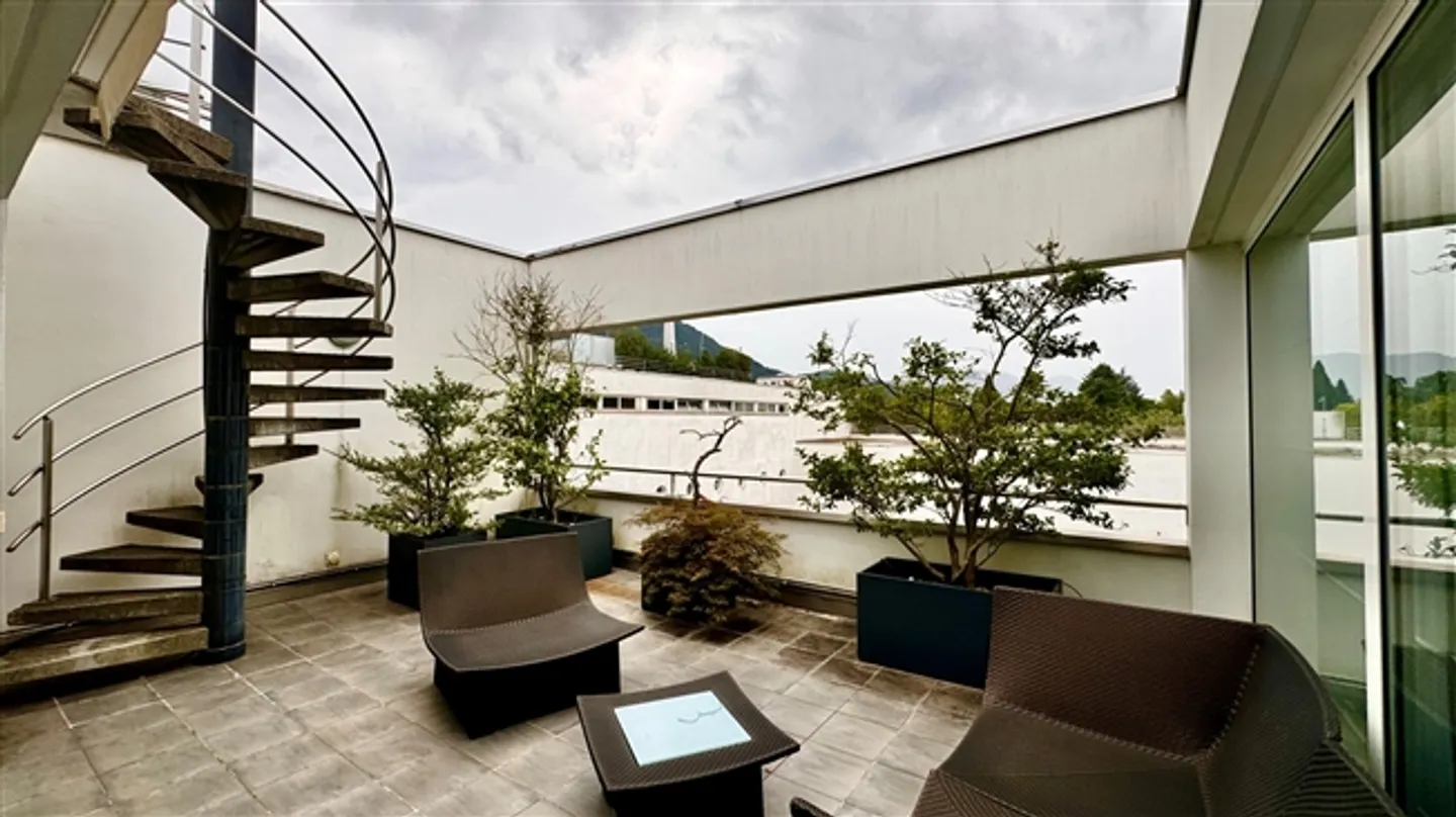 Duplex Penthouse Charmant avec Double Vue et Terrasse sur le Toit - Photo 9 sur 20