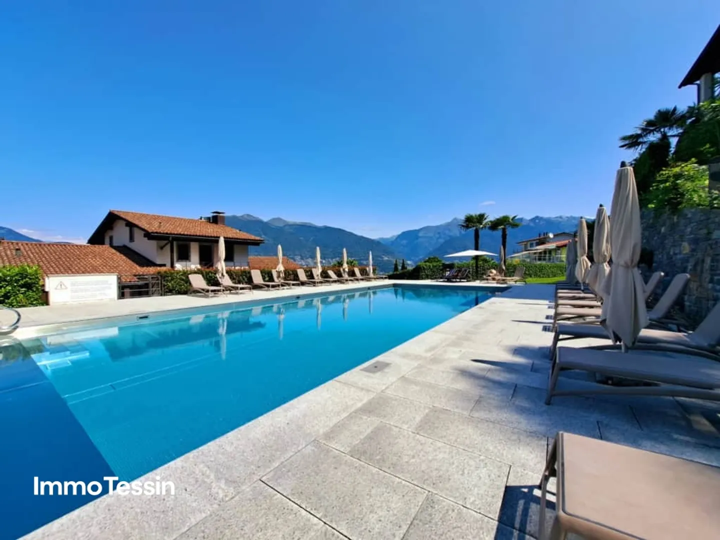 Appartement de vacances dans la magnifique résidence Miralago avec piscine et vue spectaculaire sur le lac Majeur - Photo 2 sur 13