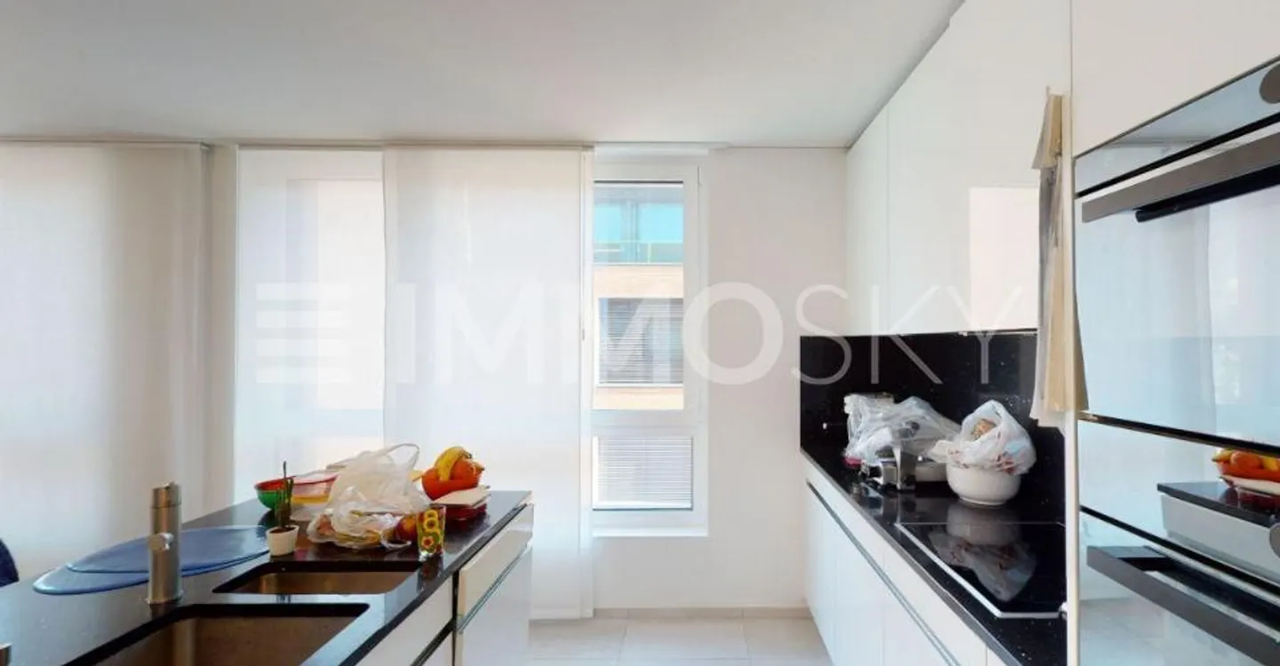 Appartement moderne avec terrasse - Photo 3 sur 5