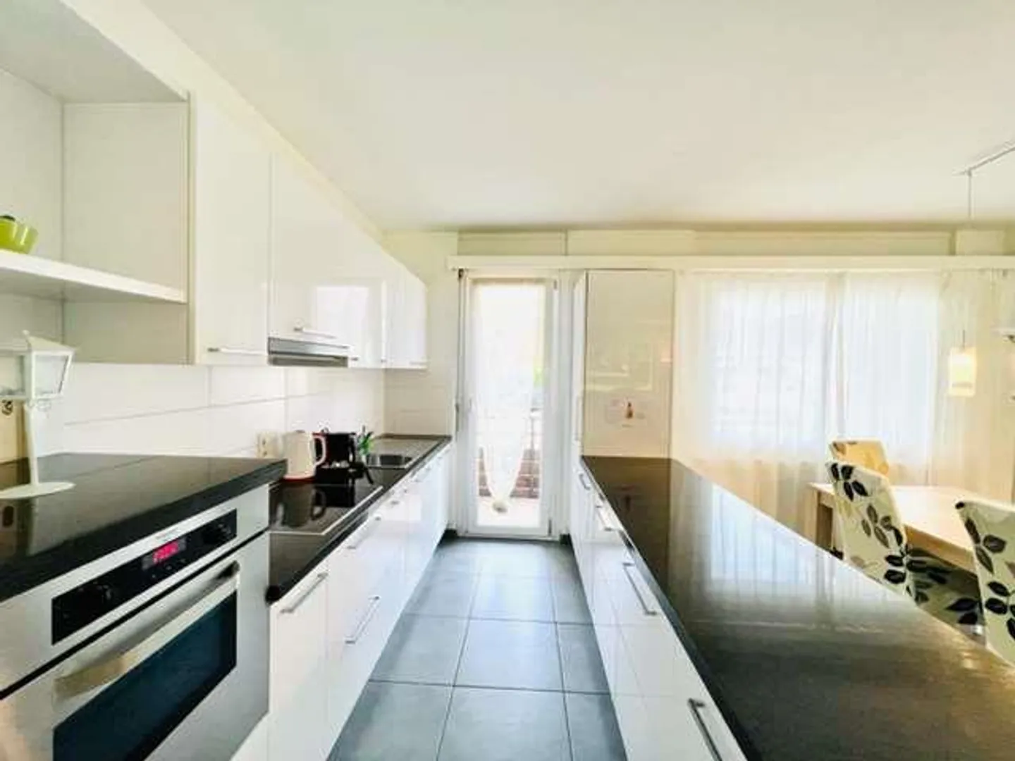 Appartamento accogliente di 4,5 locali con giardino - Foto 2 di 13