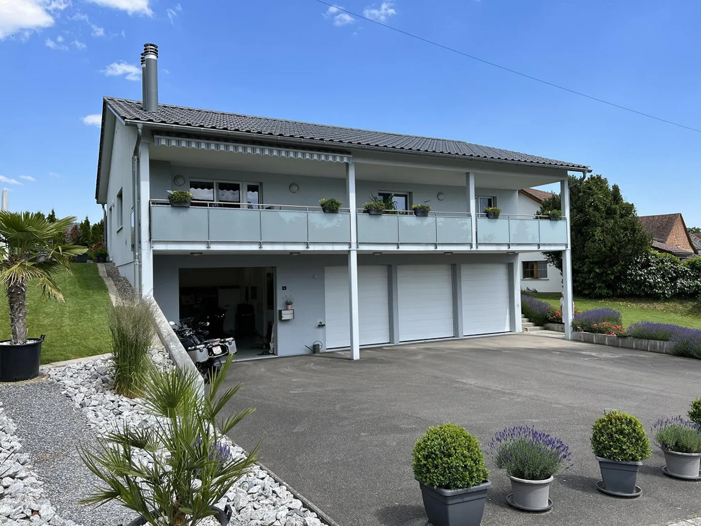 Well-maintained, newer property with large garage/workshop area - Photo 1 of 14