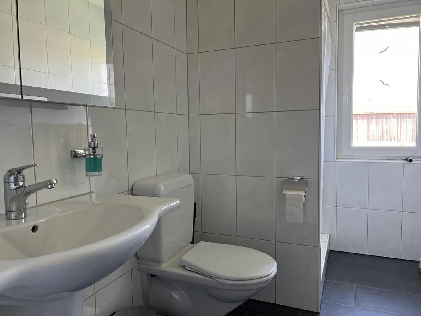 Well-maintained, newer property with large garage/workshop area - Photo 6 of 14