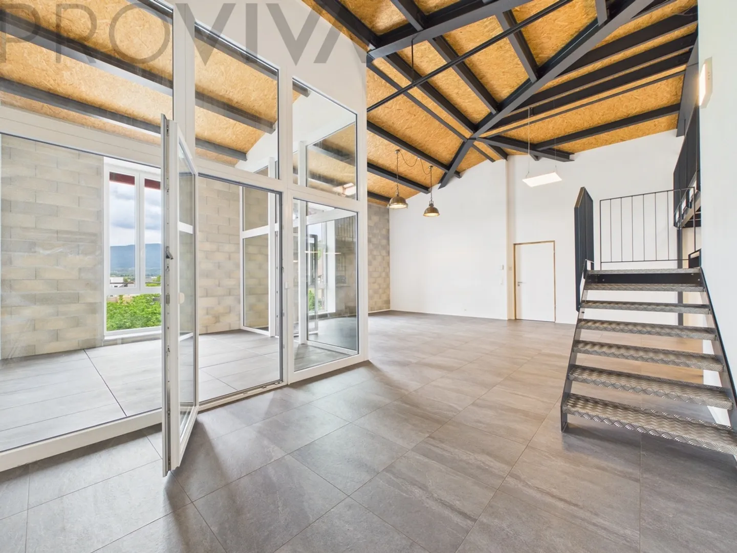 Appartement Loft Moderne avec Galerie à Gampelen - Photo 3 sur 8