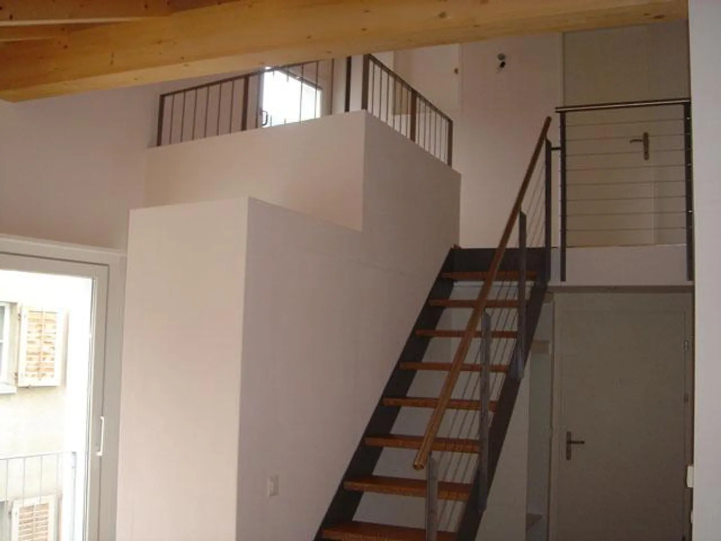 Appartement en maisonnette de 4 pièces et demie - Photo 3 sur 7