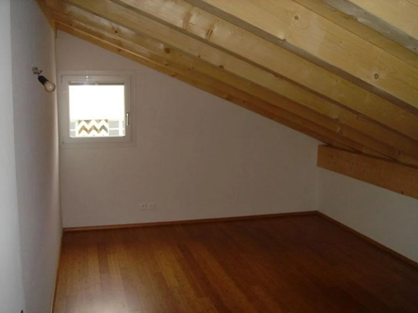 Appartement en maisonnette de 4 pièces et demie - Photo 4 sur 7
