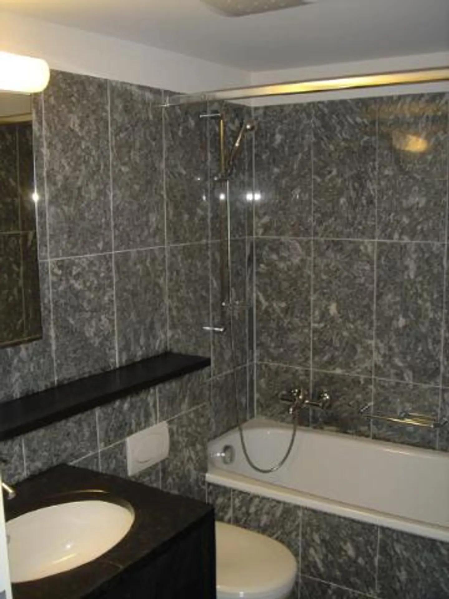 Appartement en maisonnette de 4 pièces et demie - Photo 7 sur 7