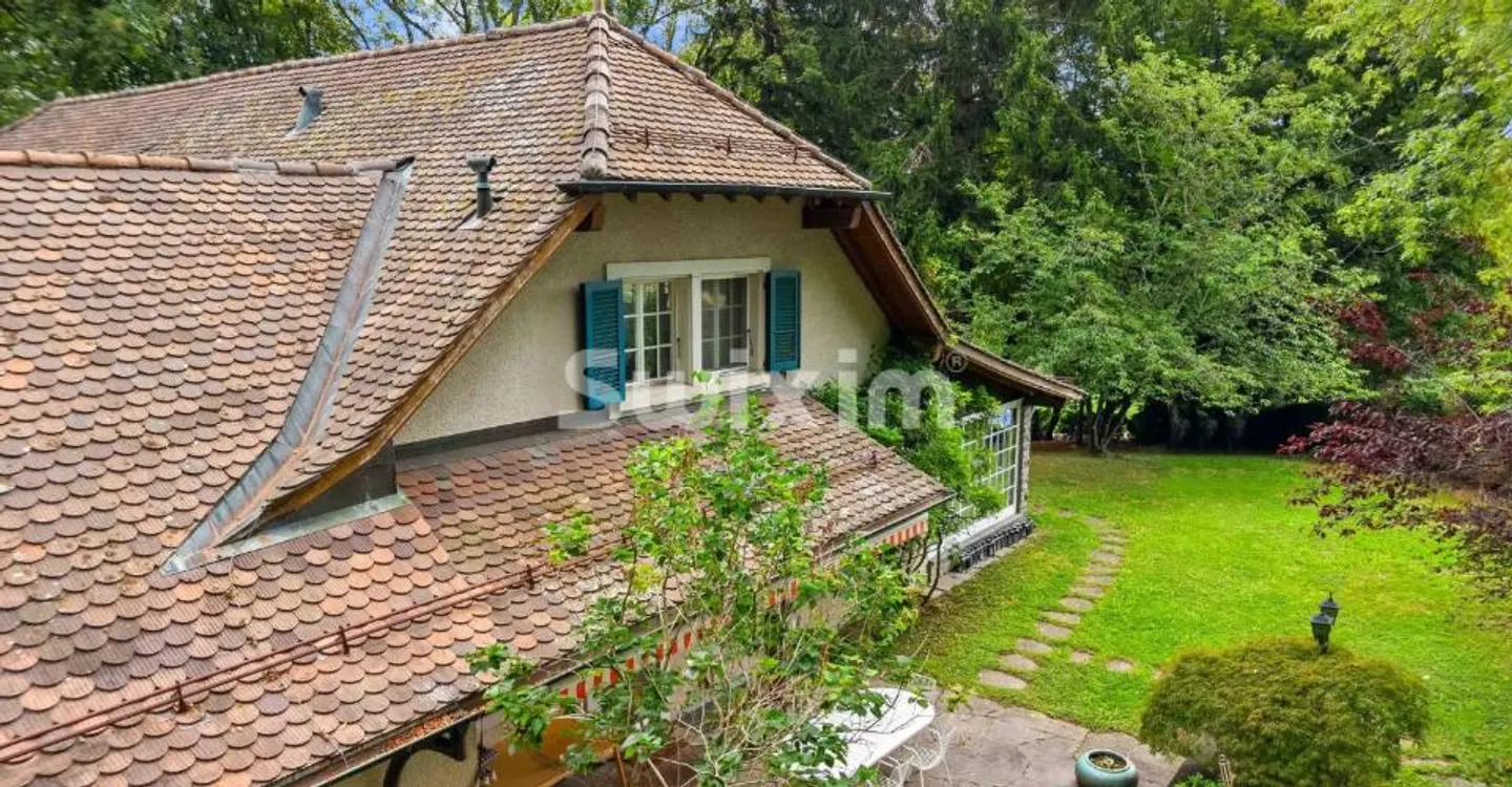 Elegant home full of charm in the heart of a wooded park - Photo 9 of 9