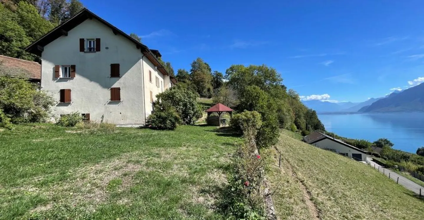 BUILDING OF 4 APARTMENTS TO RENOVATE WITH EXCEPTIONAL PANORAMIC VIEW OF LAKE LEMAN AND THE ALPS - Photo 1 of 12