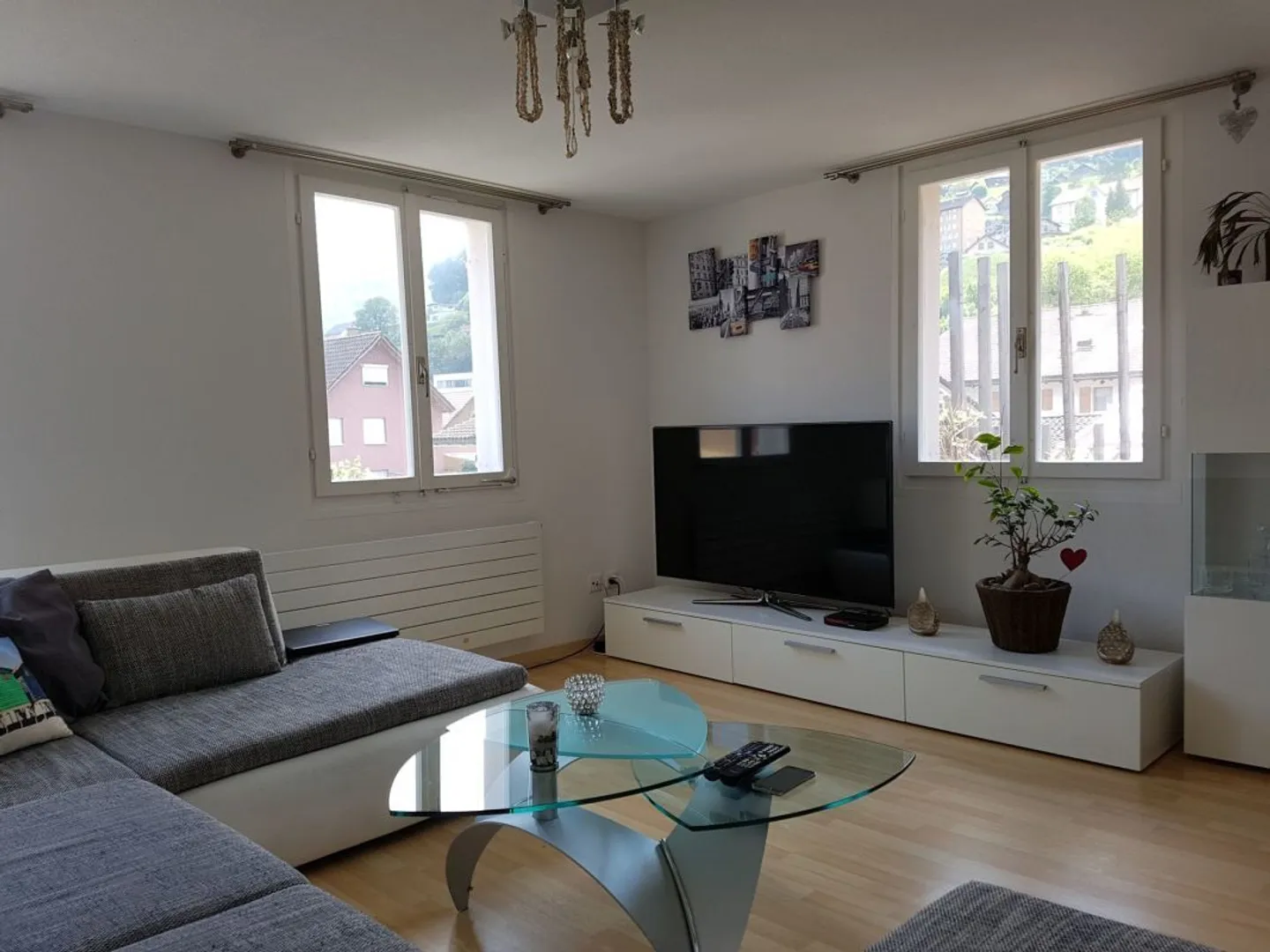 Appartement en duplex de 4,5 pièces avec grande terrasse - Photo 3 sur 12